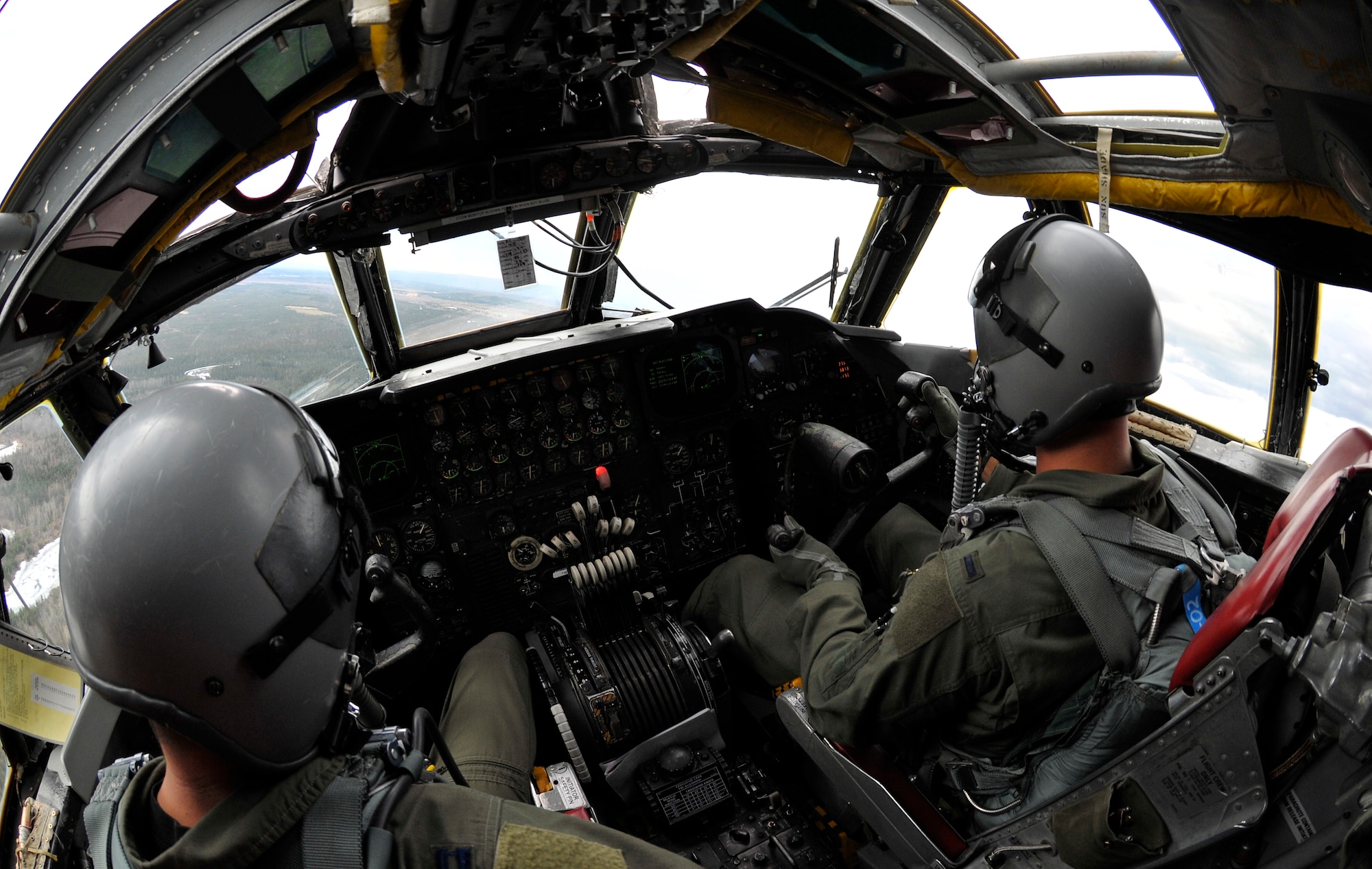 Capt. Matt Baker and his co-pilot, 1st Lt. Ryan Egan, fly over the Joint Pacific Alaska Range Complex during a RED FLAG-Alaska 10-2 sortie on a B-52H Stratofortress, April 29, 2010, Eielson Air Force Base, Alaska. RF-A provides unique opportunities to integrate various forces into joint, coalition and bilateral training from simulated forward operating bases. Captain Baker and Lieutenant Egan are assigned to the 96th Bomb Squadron, Barksdale AFB, Louisiana. (U.S. Air Force photo/Staff Sgt. Christopher Boitz)