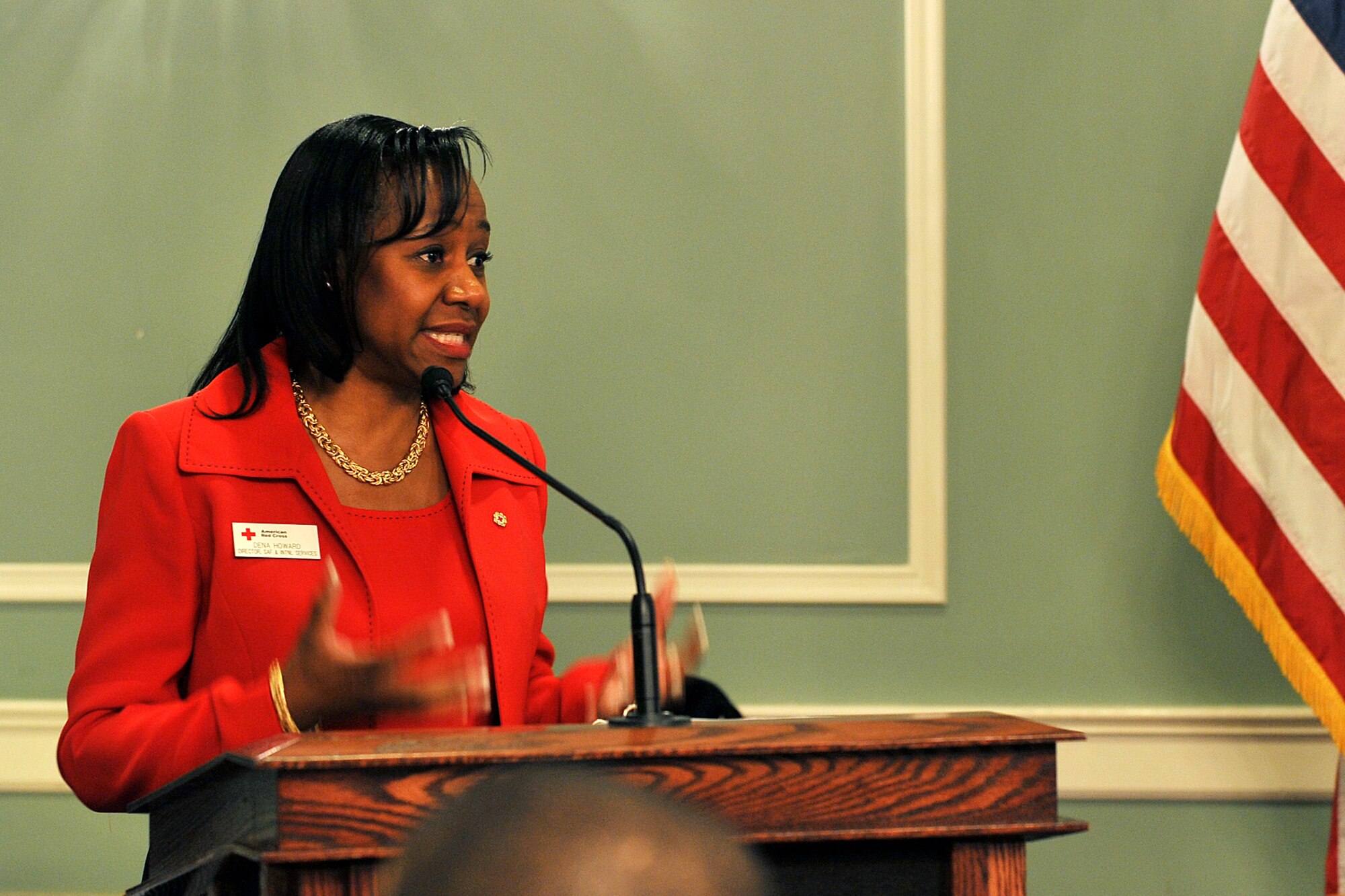 OFFUTT AIR FORCE BASE, Neb. -- Claudine Howard, director, service to armed forces families and international services for the Red Cross here, speaks about the importance of volunteerism during the Volunteer Appreciation Reception at the Patriot Club here April 28. More than 80 people from various organizations on and off-base attended the event to honor the contributions of Offutt's many volunteers. U.S. Air Force photo by Charles Haymond