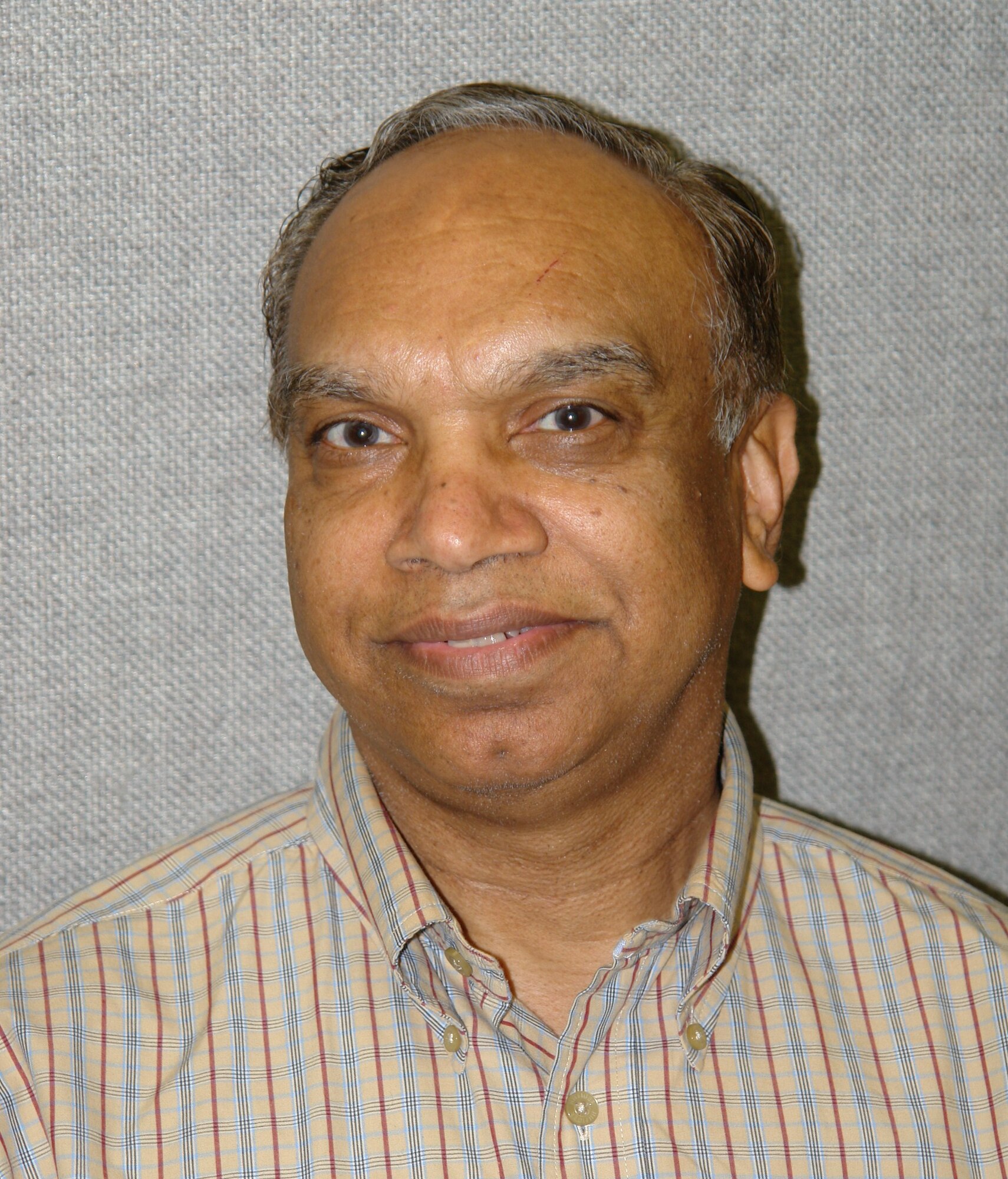 Ramesh Gulati, Aerospace Testing Alliance asset management and reliability planning manager, teaches Maintenance and Reliability Principles and Best Practices courses at Arnold Engineering Development Center and has compiled some of that information in a book. (U.S. Air Force photo by Andrea Stephens)
