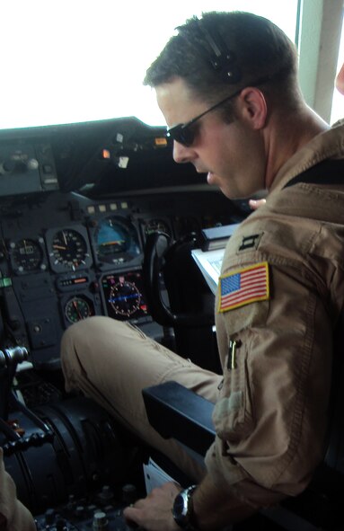 Capt. Jeremy Leach, a KC-10 Extender pilot with the 908th Expeditionary Air Refueling Squadron, flies a KC-10 during an air refueling mission for the 380th Air Expeditionary Wing from a non-disclosed base in Southwest Asia on April 24, 2010. Captain Leach is deployed from the 2nd Air Refueling Squadron, 305th Air Mobility Wing, Joint Base McGuire-Dix-Lakehurst, N.J., and his hometown is Annapolis, Md. (U.S. Air Force Photo/Master Sgt. Scott T. Sturkol/Released) 
