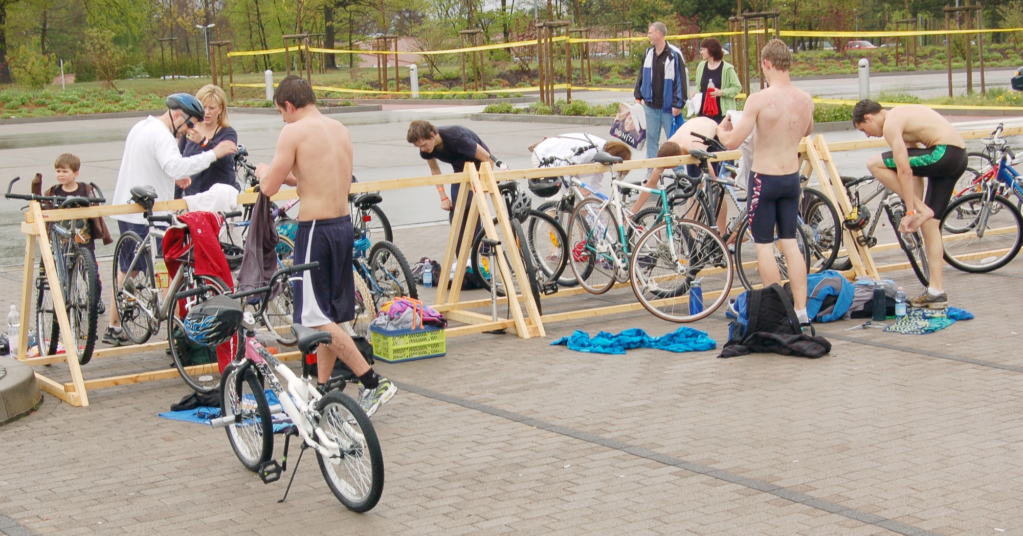 Youth transition from the swimming to the biking portion of the second annual FitFactor Triathlon, Ramstein Air Base, Germany, May 2, 2010. Participants biked either three or eleven miles, depending on their age category. (U.S. Air Force photo by Senior Airman Amanda Dick)