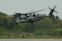 A CH-53 E Sea Stallion carries U. S. Marines of 2nd Marine Air Wing, Cherry Point, N.C., to Boston, Mass., in support of Marine Week Boston on May 3, 2010. Marine Week Boston provides an opportunity to increase public awareness of the Marine Corps' value to our nation's defense and to preserve and mature the Corps' relationship with the American people.