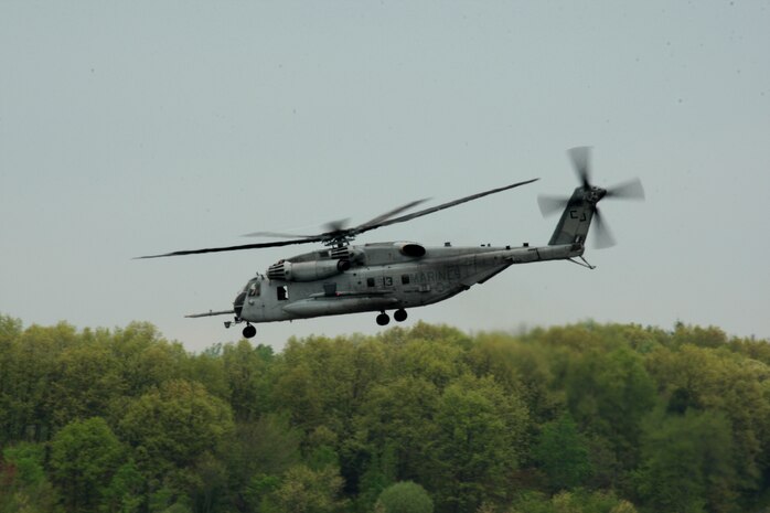 A CH-53 E Sea Stallion carries U. S. Marines of 2nd Marine Air Wing, Cherry Point, N.C., to Boston, Mass., in support of Marine Week Boston on May 3, 2010. Marine Week Boston provides an opportunity to increase public awareness of the Marine Corps' value to our nation's defense and to preserve and mature the Corps' relationship with the American people.