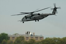 A CH-53 E Sea Stallion carries U. S. Marines of 2nd Marine Air Wing, Cherry Point, N.C., to Boston, Mass., in support of Marine Week Boston on May 3, 2010. Marine Week Boston provides an opportunity to increase public awareness of the Marine Corps' value to our nation's defense and to preserve and mature the Corps' relationship with the American people.