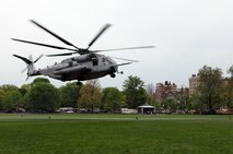 A CH-53E Super Stallion helicopter crewed and piloted by Marines from Marine Heavy Helicopter Squadron 461, a unit based out of Marine Corps Air Station New River, N.C., touches down on Boston Common May 3 during an exhibition as part of Marine Week Boston. The squadron recently returned from a deployment with the 22nd Marine Expeditionary Unit in direct support of Haiti relief efforts in February.