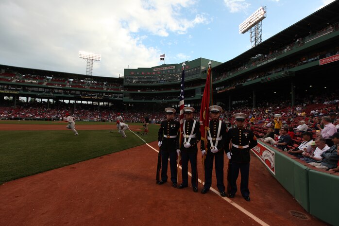 The Marine Corps Logistics Base Albany, Ga., Color Guard wait for their queue to represent the colors during the playing of the national anthem at Fenway Park May 3, 2010.