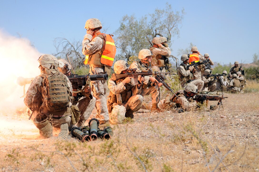 Platoon commander 2nd Lt. Alan Jersey, of Company B, 1st Battalion, 1st Marine Regiment, fires a rocket from a Shoulder-mounted Multipurpose Assault Weapon during a helicopter-borne raid on a simulated insurgent camp in the Chocolate Mountains in California, May 3, 2010. Inserting in four different locations, via MV-22 Ospreys, CH-46 Sea Knights and CH-53 Super Stallions, Companies B and C, along with the Weapons Company, assaulted the camp with small-arms fire and rockets. Here supporting the current Weapons and Tactics Instructor course, the Camp Pendleton, Calif.-based unit is also training for a deployment early next year with the 13th Marine Expeditionary Unit.