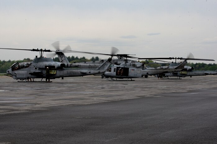 U. S. Marines of 2nd Marine Air Wing, Cherry Point, N.C., prepare AH-1 HueyCobras for a flight to Boston, Mass., in support of Marine Week Boston on May 3, 2010. Marine Week Boston provides an opportunity to increase public awareness of the Marine Corps' value to our nation's defense and to preserve and mature the Corps' relationship with the American people.