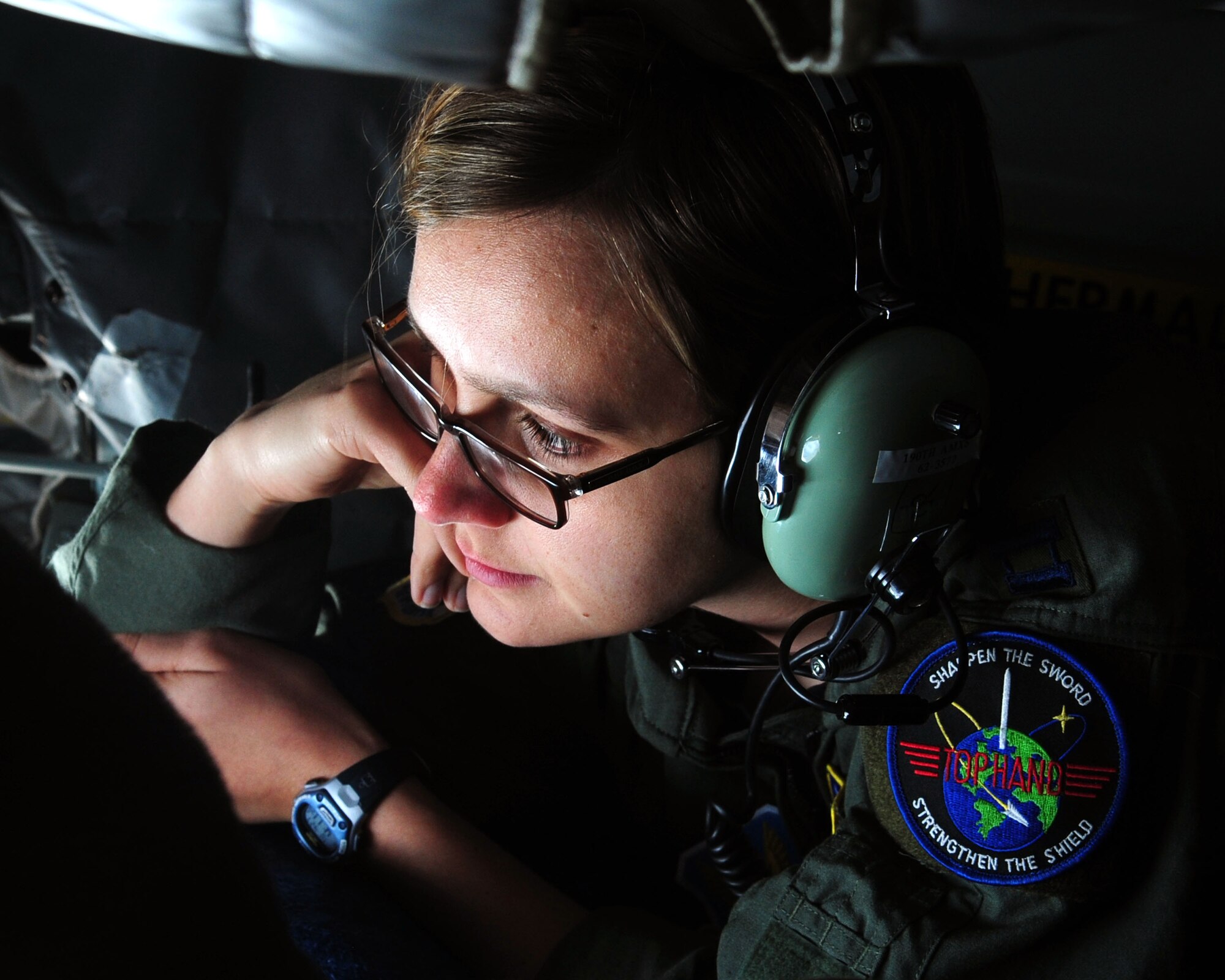 Capt. Jeanie Moughan, wife of Capt. Pete Moughan, a student assigned to the 358th Fighter Squadron, watches as her husband refuels for the first time during an aerial refueling mission in the Tombstone Military Operating Area in Southern Arizona April 27. Six pilots from the 358th Fighter Squadron completed their first aerial refueling mission as part of their A-10C Pilot Initial Qualification course to become fully qualified A-10C attack pilots. (U.S. Air Force photo/Airman Jerilyn Quintanilla)