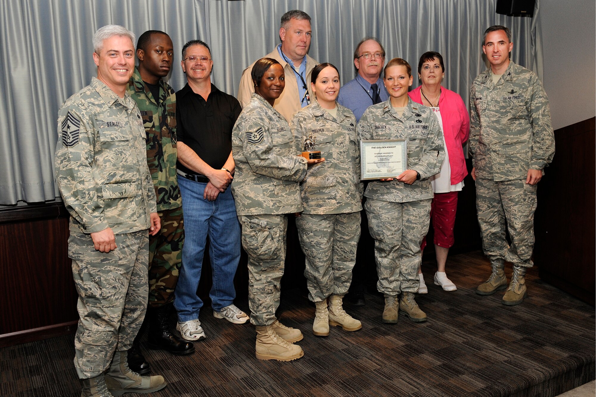 The 21st Logistics Readiness Squadron supply flight was named the March Golden Knight recipient. (U.S. Air Force photo/Craig Denton)