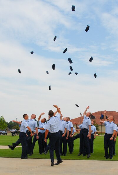 MAXWELL-GUNTER AIR FORCE BASE, Ala. – Basic Officer Training Class 09-06 students toss their caps up in celebration of their graduation at Maxwell AFB, Ala., in July 2009. (U.S. Air Force photo/Jamie Pitcher)