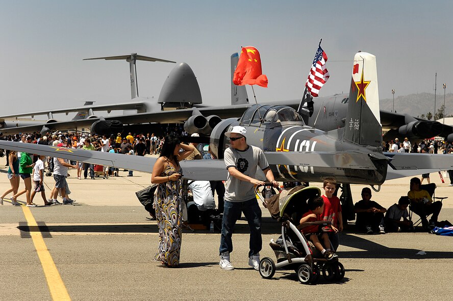 Spectators explore static aircraft displays at the March Field AirFest, March Air Reserve Base, Calif., May 1, 2010. March Field AirFest is a two-day event featuring performances and static displays of civilian and military aircraft. (U.S. Air Force photo by Tech. Sgt. Carolyn Erfe/Released)