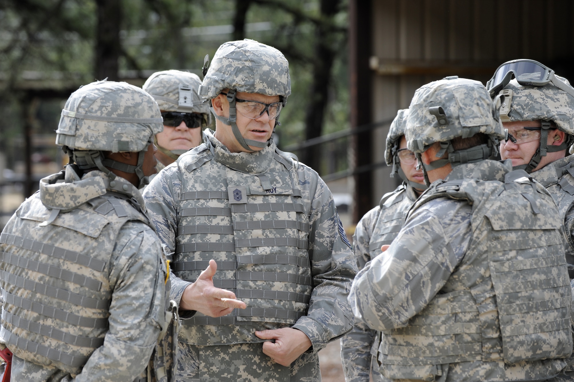 Chief Master Sgt. of the Air Force James Roy takes the opportunity to ask questions and talk with class leaders while visiting a combat training skills training class on the Dix firing ranges April 27. Chief Roy spent two days here to gain first-hand knowledge of Air Force and Army expeditionary skills training. (U.S. Air Force photo/Carlos Cintron)