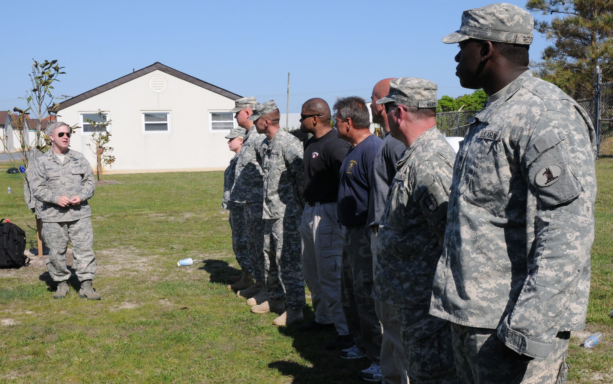 Brig. Gen. Keith D. Kries, deputy assistant Chief of Staff for Operations, U.S. Forces Korea and United Nations Command, Yongsan Army Garrison, South Korea, coined U.S. Army National Guard and Delaware State Police personnel for their assistance with the Junior Officer Leadership Development course April 30 at National Guard Bethany Beach Training Site. More than 60 Air Force Reserve officers from throughout the nation came to the First State to hone their leadership skills as part of the Junior Officer Leadership Development course hosted by the 512th Airlift Wing April 29-May 2. (U.S. Air Force photo/Capt. Marnee A.C. Losurdo)