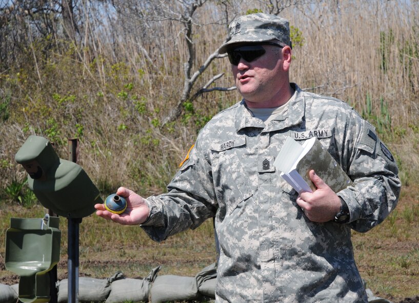 U.S. Army Command Sgt. Maj. Kenneth Hardy, National Guard Bethany Beach Regional Training Institute, explains the fundementals of grenade throwing to Air Force Reserve officers attending the Junior Officer Leadership Development course, hosted by the Air Force Reserve's 512th Airlift Wing, Dover, Del. More than 60 Reserve officers from throughout the nation attended the course held April 29 to May 2. (U.S. Air Force photo/Capt. Marnee A.C. Losurdo)