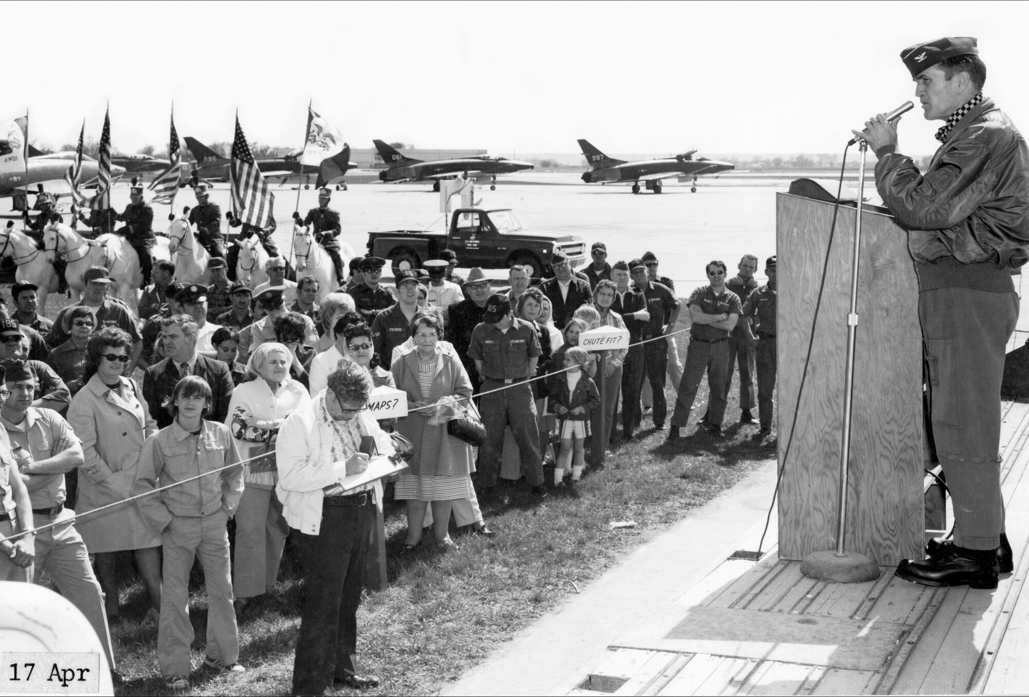 USAF Col George E. (Bud) Day talks to a crowd gathered at the Air National Guard’s 185th Tactical Fighter Group in Sioux City, Iowa.  Day had been released just one month earlier as a prisoner of war from North Vietnam. Bud Day was commander of the Misty FACs, who flew forward air control missions in risky parts of North Vietnam. Their job was to find and mark the targets for strike aircraft. Day was shot down and captured in August of 1967 and was held and until March of 1973.
