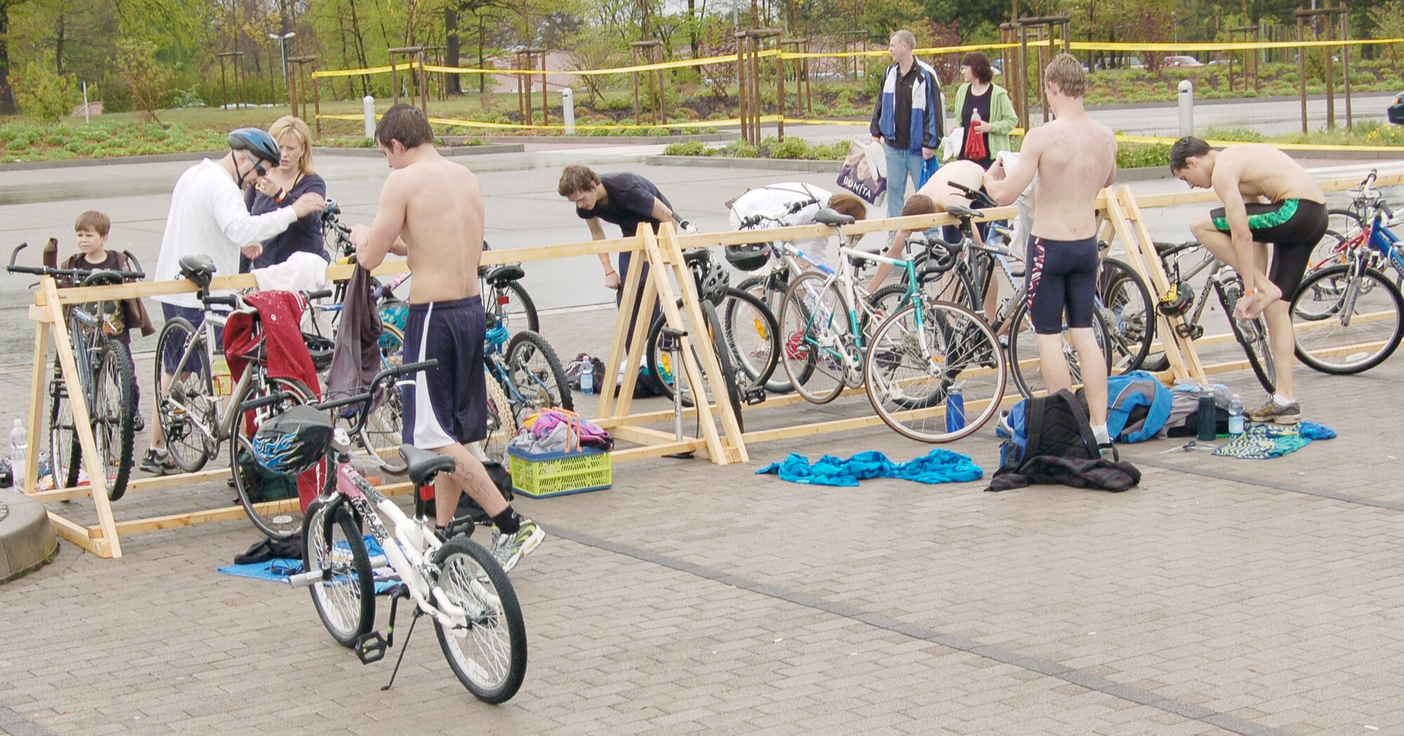 Youth transition from the swimming to the biking portion of the second annual FitFactor Triathlon May 2, 2010, at Ramstein Air Base, Germany. Participants biked either three or 11 miles, depending on their age category. (U.S. Air Force photo by Senior Airman Amanda Dick)