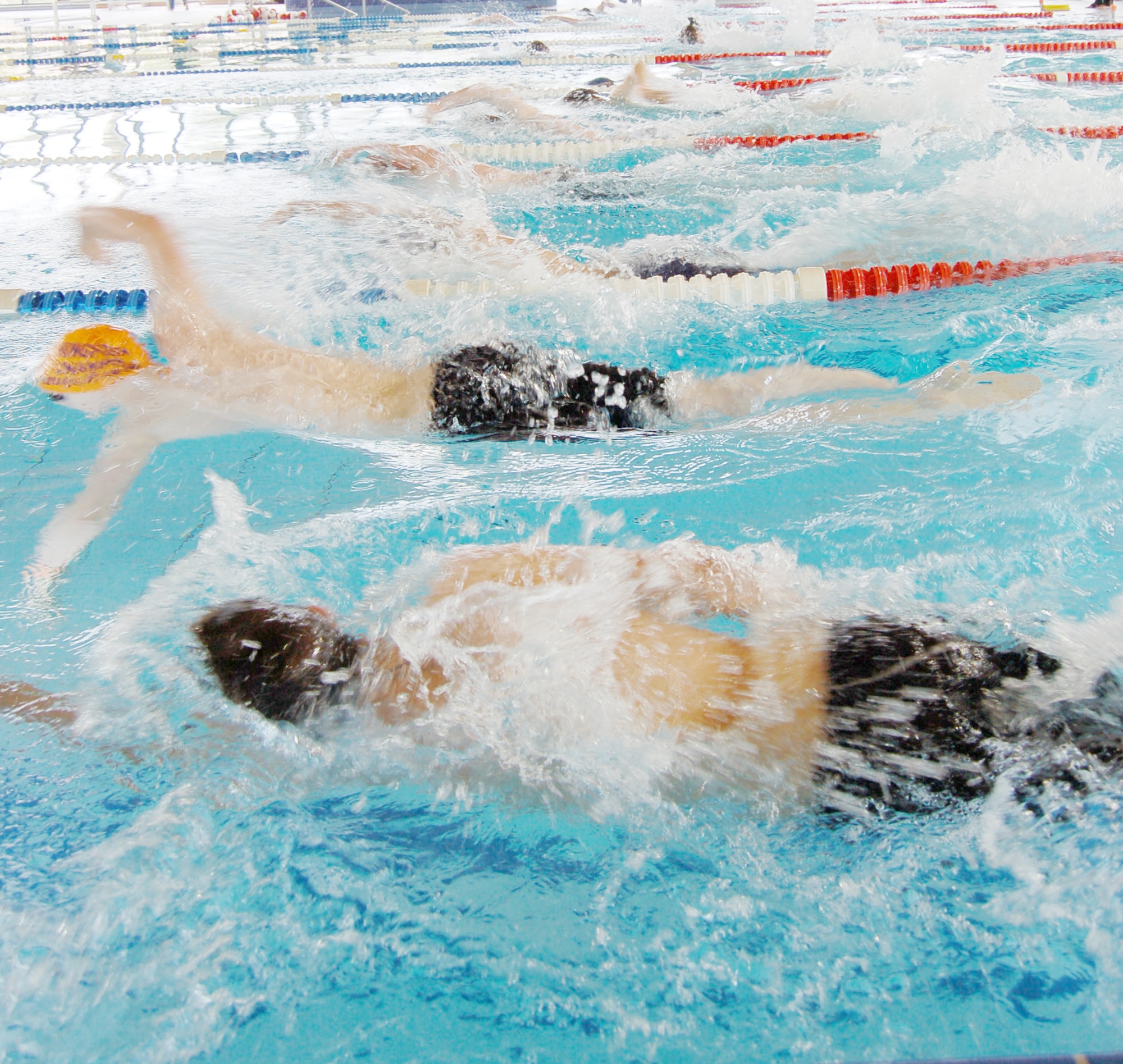 Youth compete in the third heat of the swimming portion during the second annual FitFactor Triathlon May 2, 2010, at Ramstein Air Base, Germany. Participants swam either 200 or 500 meters, depending on their age category. (U.S. Air Force photo/Senior Airman Amanda Dick)