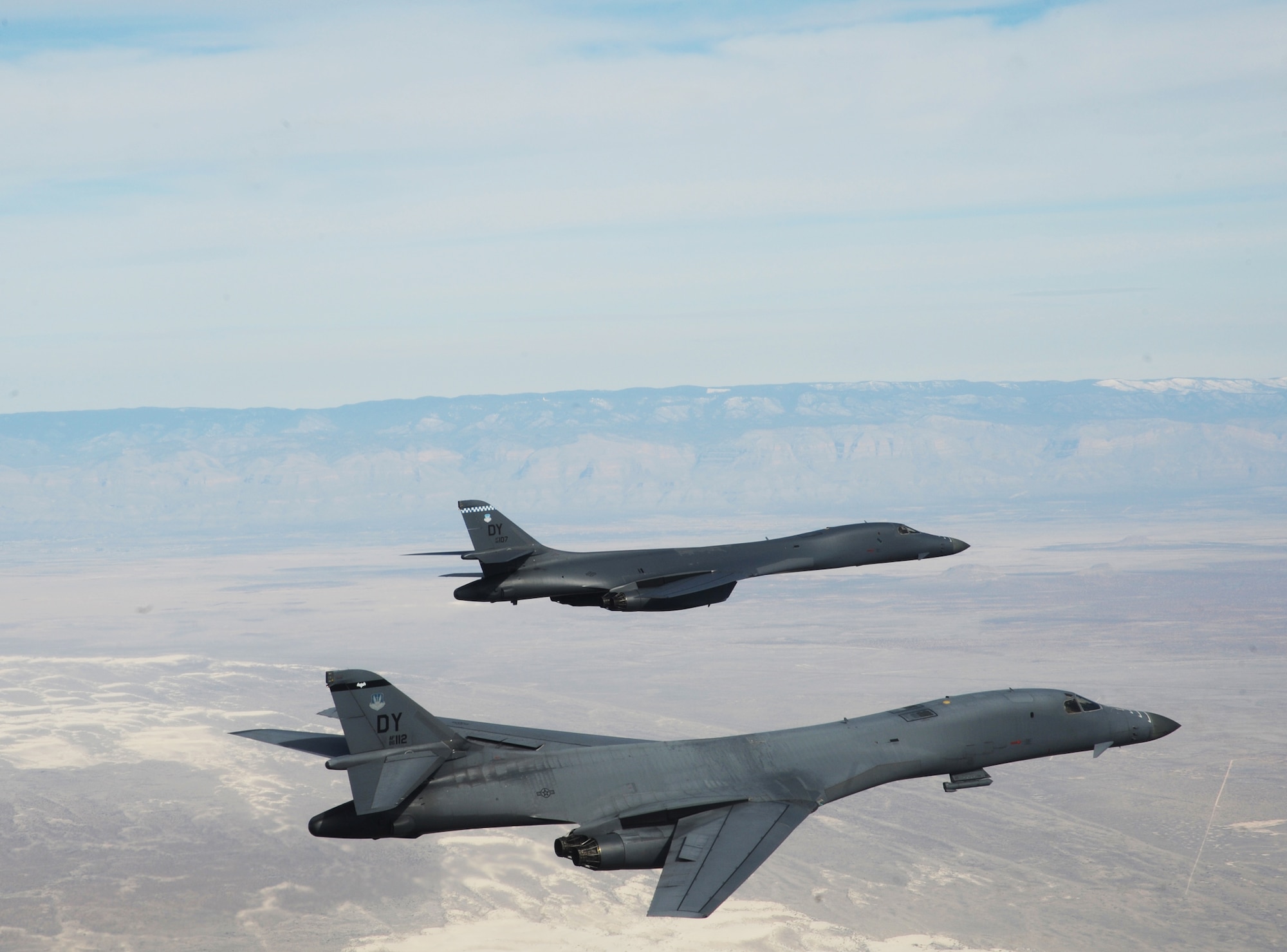 A two-ship formation of B-1B Lancers assigned to the 28th Bomb Squadron, Dyess Air Force Base, Texas, fly in formation over New Mexico during a training mission Feb. 24, 2010.  Dyess celebrates the 25th anniversary of the first B-1B bomber arriving at the base. (U.S. Air Force photo/Master Sgt. Kevin J. Gruenwald) 