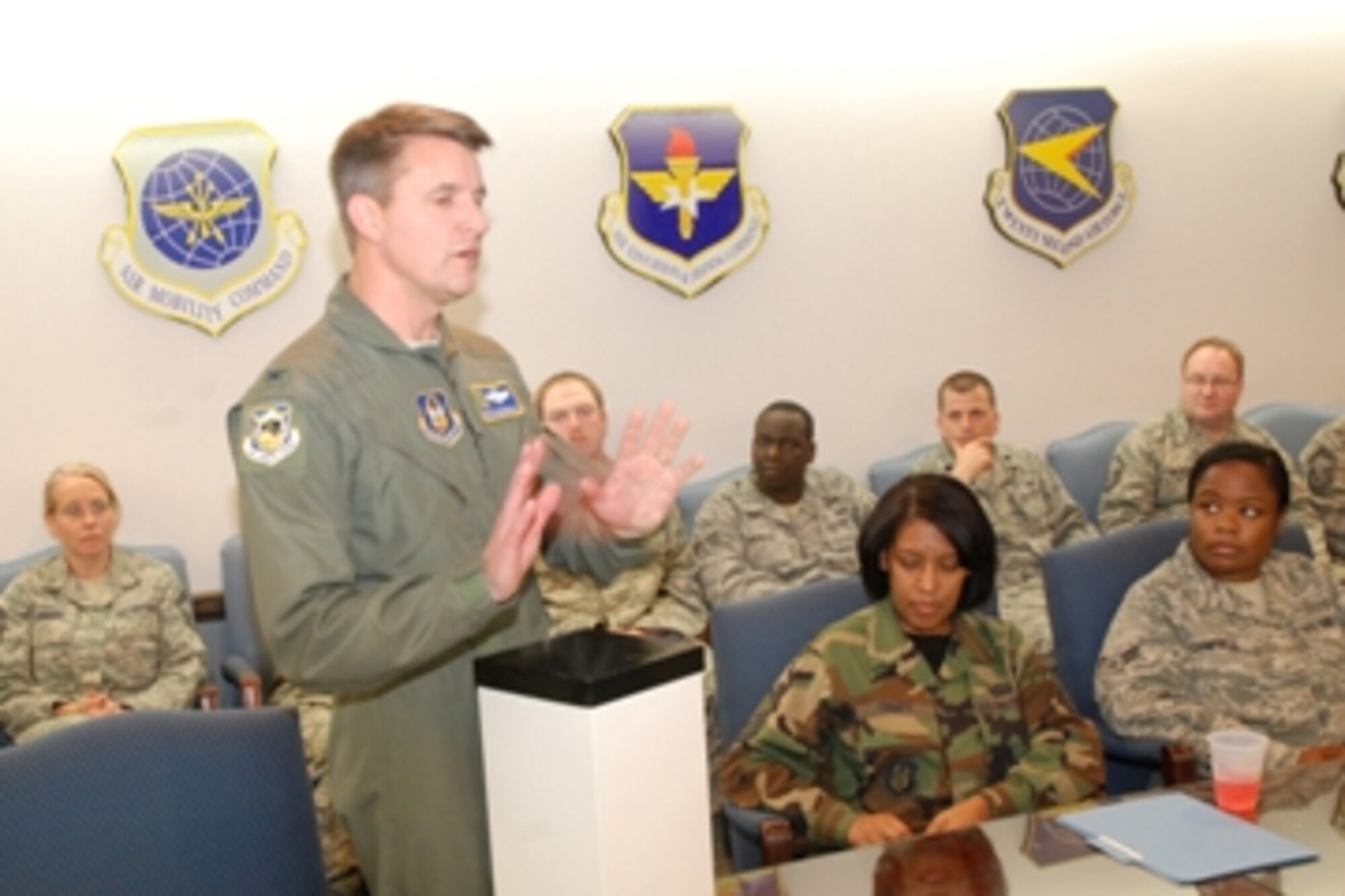 Col. Heath Nuckolls gives farewell remarks to the 94th Airlift Wing personnel.