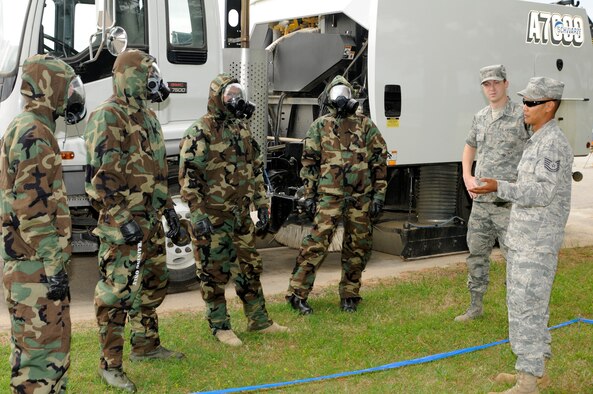 Tech Sgt. Robby McGee with the 188th Fighter Wing Civil Engineering Squadron, right, teaches a class on Chemical, Biological, Radiological and Nuclear (CBRNE) response during a unit training assembly at the 188th May 2, 2010. The training is a semiannual requirement for all members of the Air National Guard. The training, which simulated an event, ensures all members of the ANG are furnished with the skills necessary to properly utilize the CBRNE equipment and how decontamination procedures are administered. (U.S. Air Force photo by Tech Sgt. Stephen Hornsey/188th Fighter Wing Public Affairs)