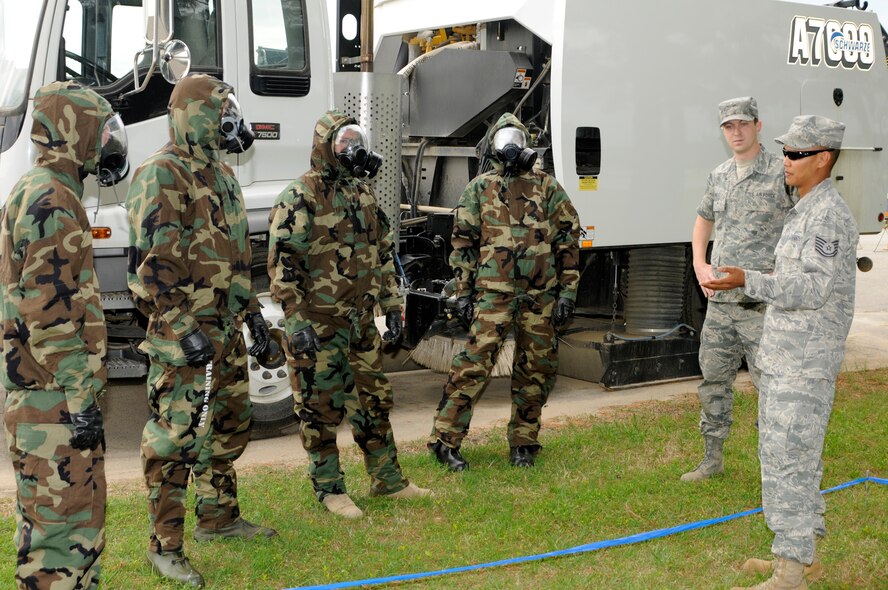 Tech Sgt. Robby McGee with the 188th Fighter Wing Civil Engineering Squadron, right, teaches a class on Chemical, Biological, Radiological and Nuclear (CBRNE) response during a unit training assembly at the 188th May 2, 2010. The training is a semiannual requirement for all members of the Air National Guard. The training, which simulated an event, ensures all members of the ANG are furnished with the skills necessary to properly utilize the CBRNE equipment and how decontamination procedures are administered. (U.S. Air Force photo by Tech Sgt. Stephen Hornsey/188th Fighter Wing Public Affairs)