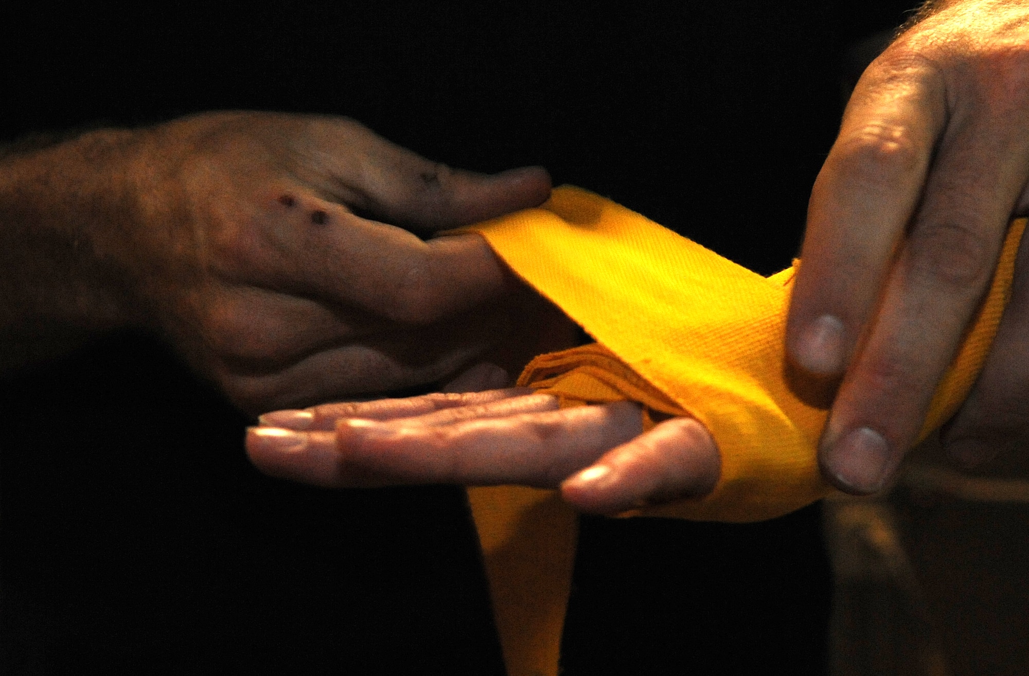 Staff Sgt. Vincent Carll, 506th Expeditionary Civil Engineer Squadron heavy equipment operator, trains Staff Sgt. Sandra Mihovich, 506th Security Forces Squadron military working dog trainer, at Kirkuk Regional Air Base, Iraq on April 28, 2010.  Sergeant Carll uses his experience as a mixed martial arts cage fighter to train his fellow servicemember to fight in the upcoming Smoker 3 boxing tournament May 8.  He is deployed from Homestead Air Reserve Base, Fla.  (U.S. Air Force photo/Staff Sgt. Tabitha Kuykendall/Released)