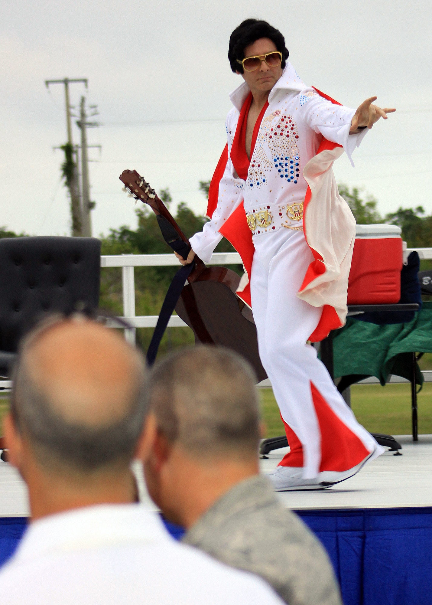 HOMESTEAD ARB, Fla -- Master Sgt. Frank Navarro appears and performs as Elvis during a ceremony for Brig. Gen. William "Blaze"  May 1. The presentation occured during "Blaze's Backyard BBQ Farewell". General Binger will be leaving for Robbins AFB, Ga. to the the new Force Generation Commander.