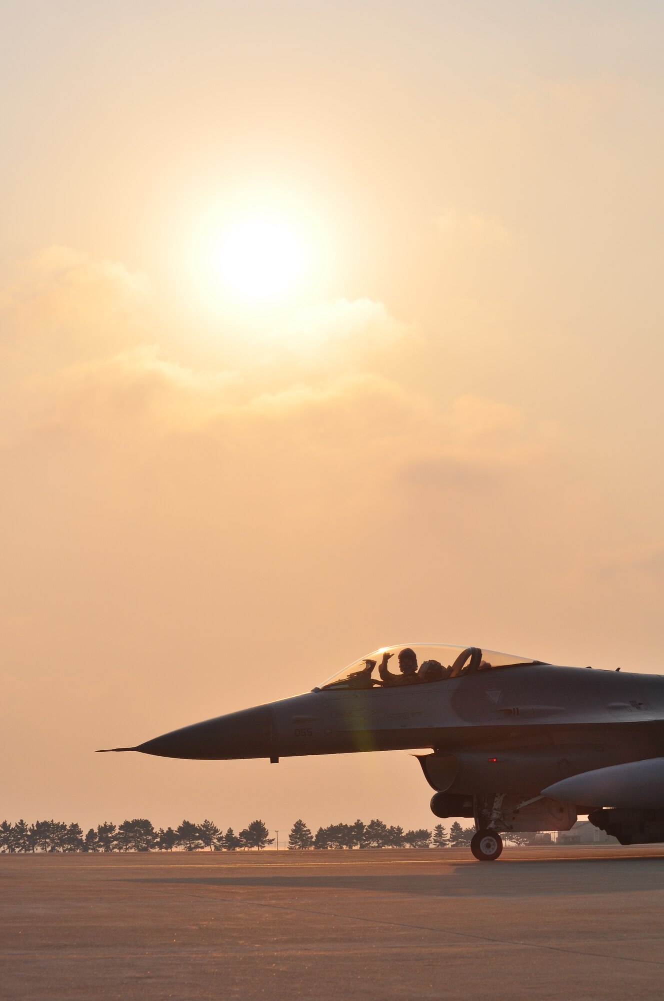 An F-16 Fighting Falcon taxis down the runway with live ordnance during a no notice exercise here April 23.
The Wolf Pack generated both F-16 Fighting Falcons and visiting F-15E Strike Eagles with live ordnance. During the day-long exercise base units were tested on their ability to successfully conduct the mission at a moment's notice; and unlike most exercises, this was completed with absolutely no warning. The exercise culminated with all aircraft taxiing to the end of the runway and then returning to their shelters. (Courtesy photo)
