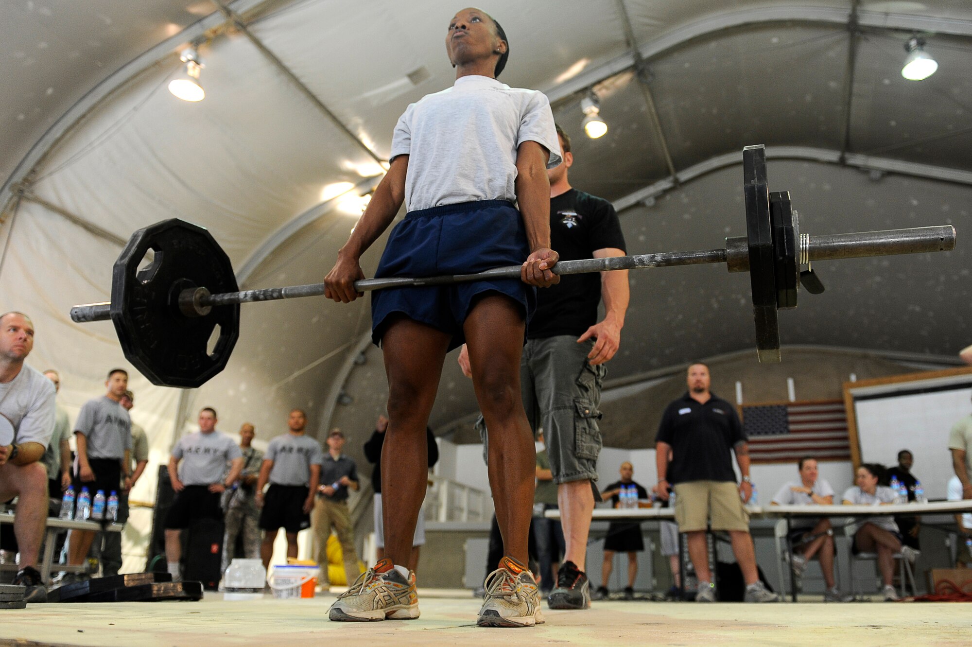 U.S. Air Force Senior Master Sgt. Anita Easter, 455th Air Expeditionary Wing, Legal Office, dead lifts during the "Strongest in the Area of Operations" competition at Bagram Airfield, Afghanistan, May 1, 2010. Sergeant Easter is deployed from Travis Air Force Base, Calif., and is from Phoenix, Ariz. (U.S. Air Force photo by/ Master Sgt. Jeromy K. Cross/released)