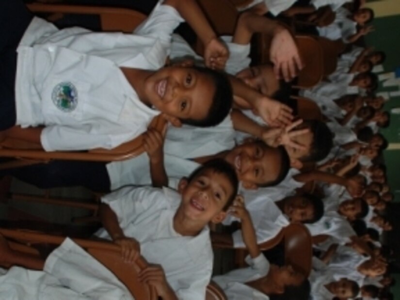 Students at Tegucigalpa's Lempira School are are all smiles during the closing ceremony of a Dental Readiness Training Exercise, in which many of the schoolchildren received free, high-quality dental care. Members of JTF-Bravo and U.S. Dental Command conducted the DENTRETE in Tegucigalpa, Honduras, April 19-29, treating 171 patients and performing 1,983 total procedures. (U.S. Air Force photo by 1st Lt. Jen Richard)