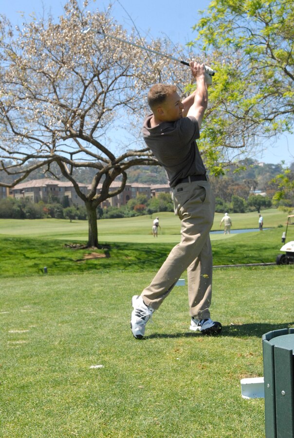 Capt. Zachary Walter, Aide-de-Camp, MCRD San Diego, sends his ball soaring at the Riverwalk Golf Course, San Diego, Calif., during the Marine Corps Community Services Marine Corps Recruit Depot’s Golf Tournament, May 4.