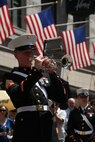 Sgt. Bryant M. Luciano, a trumpet player for Albany Marine Band and native of Pensacola, Fla., plays his trumpet during a solo performance, ''Georgia,'' in downtown Boston, Mass., in a crowd of surrounding Bostonians, May 4, 2010. Albany Marine Band performed several songs to include, ''Stars and Stripes, Marines' Hymn, What a Wonderful World and Semper Fi.'' The band's performance played a key role in Marine Week Boston to share the Corps' traditions, history and culture with Bostonians and help them learn about the Corps' value to the nation.