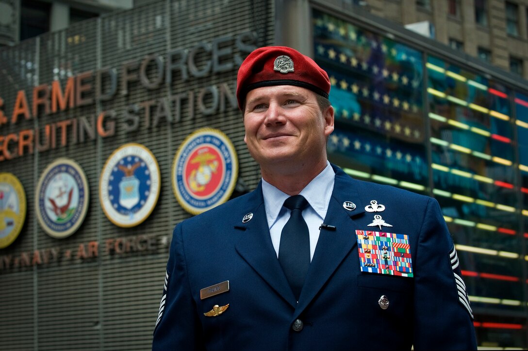 Chief Master Sgt. Antonio Travis conducts an interview for AF.mil and the Pentagon Channel May 4, 2010, at Times Square in New York City. Chief Travis was named one of the 100 most influential people in the world by the editors of TIME magazine for his efforts following the Haiti earthquake. Chief Travis is the chief enlisted manager of the Air Force Special Operations Training Center at Hurlburt Field, Fla. (U.S. Air Force photo/Staff Sgt. Bennie J. Davis III)