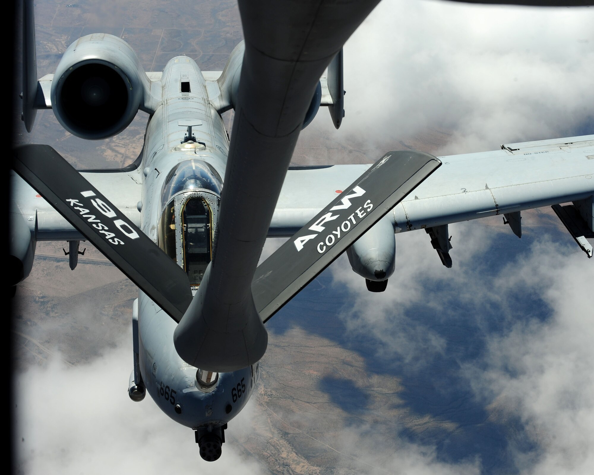 1st Lt. Dan Griffin, a pilot assigned to the 358th Fighter Squadron at Davis-Monthan Air Force Base, Ariz., positions his A-10C Thunderbolt II beneath the boom of a KC-135 Stratotanker April 27, 2010, during an aerial refueling mission over Southern Arizona.  Lieutenant Griffin is a student in the A-10C Pilot Initial Qualification Course and was one of six pilots from his squadron to refuel for the first time. Upon completion of the course in August he will become a fully qualified A-10C attack pilot. (U.S. Air Force photo/Airman Jerilyn Quintanilla)