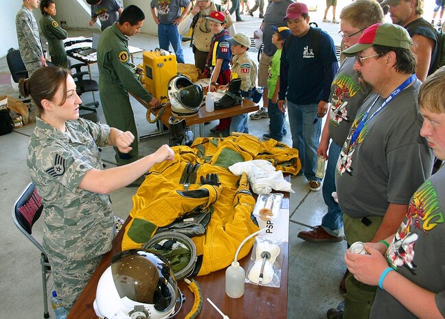 Staff Sgt. Natasha Wakefield, 9th Physiological Support Squadron aerospace physiologist, describes the function of the U-2 pilot’s pressure suit to Boy Scouts, May 1 at the flight line. The Boy Scouts came to Beale May 1-2 for the 2010 Boy Scouts of America Expo. (Air Force photo by Capt. Natasha Waggoner)