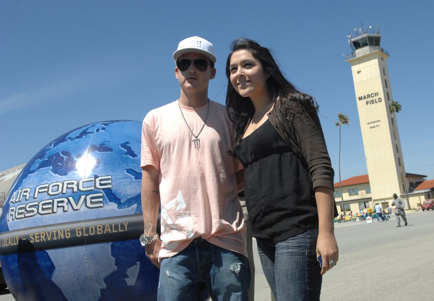 MTV celebrity Rob Dyrdek poses with a fan at the March Field AirFest, March Air Reserve Base, Calif., May 2, 2010. The AirFest is a bi-annual, two-day event featuring military and civilian aerial performances and static displays of modern and historic aircraft. (U.S. Air Force photo by Senior Airman Sean Adams/released)