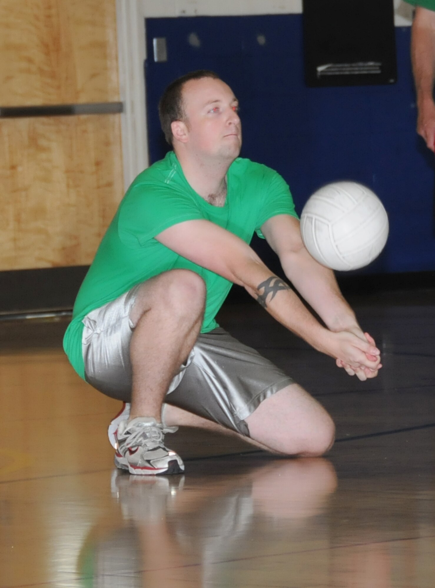 Thomas Sirovey returns a shot for the 81st TRSS during the championship match.  (U.S. Air Force photo by Kemberly Groue)