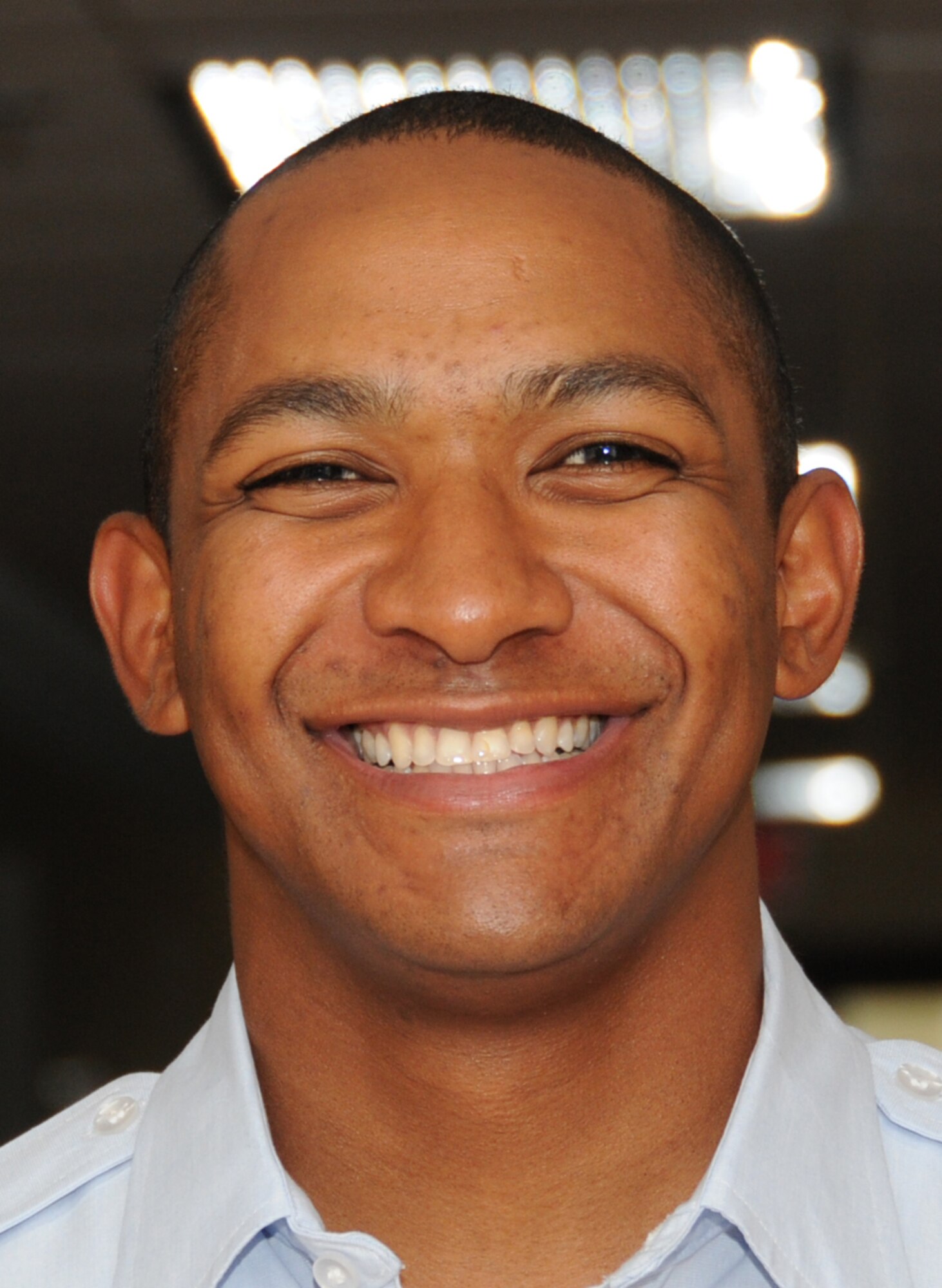 Airman 1st Class Martin Duenas graduated from the personnel apprentice course in the 335th Training Squadron with a perfect score Monday.  Airman Duenas, from Sinajara, Guam, returns to the Air National Guard at Andersen Air Force Base, Guam.  (U.S. Air Force photo by Kemberly Groue)
