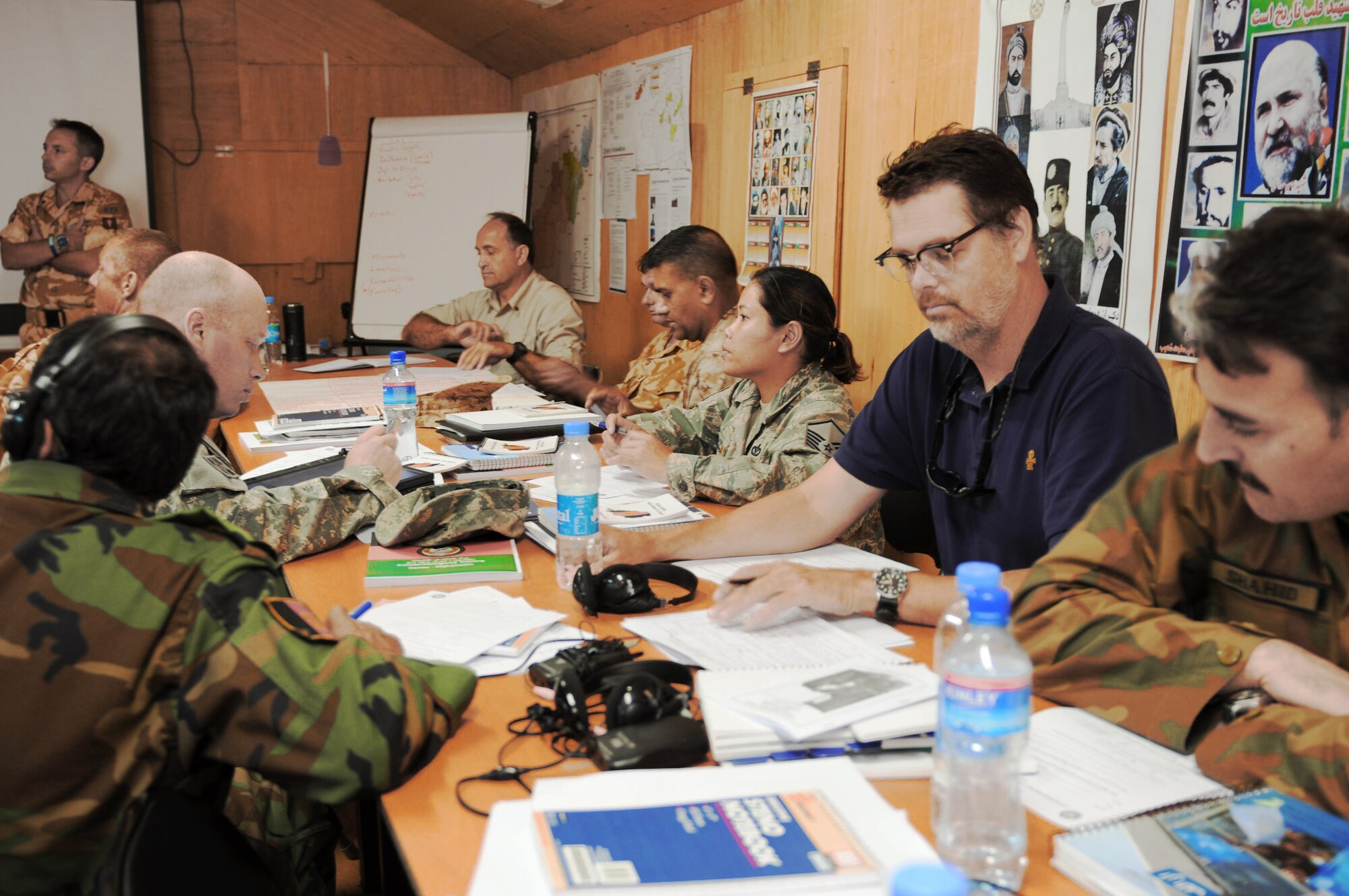 Master Sgt. Irene Mason (center) receives counterinsurgency training April 28, 2010, at the Counterinsurgency Training Academy on Camp Julien, Afghanistan. Sergeant Mason is an engineer and a member of the 1st AfPak Hands Cohort. (U.S. Army photo/Army Sgt. 1st Class Matthew Chlosta)