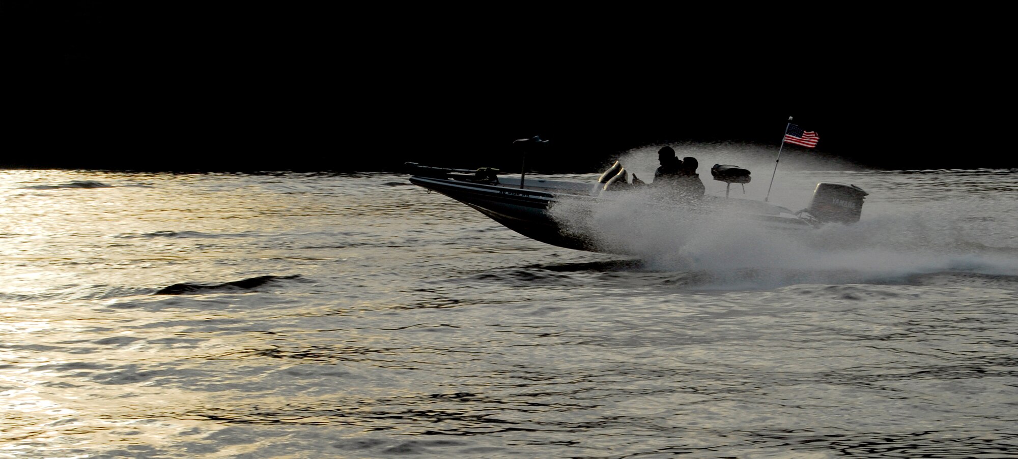 One of the first boats participating in the fifth annual Warriors on the Water fishing tournament takes off at full speed to find a fishing spot on Jordan Lake in Raleigh N.C. April 23. This year’s tournament drew more than 150 Airmen, Soldiers, Marines and Sailors from military installations across the country. (U.S. Air Force photo/Senior Airman Quentin Irvin)