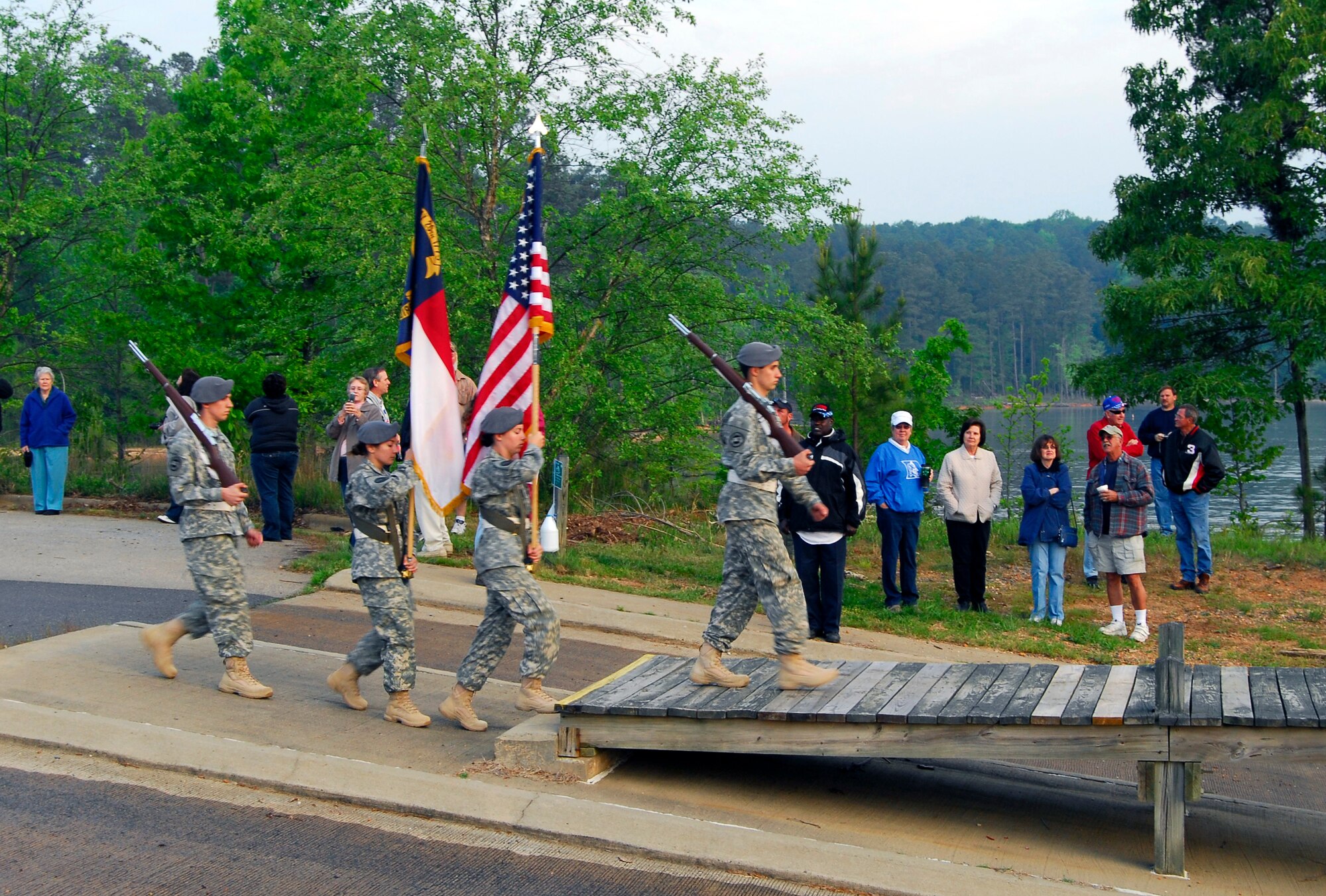 Members of the Fort Bragg Honor Guard post the colors near the New Hope Outlook boat ramp on Jordan Lake in Raleigh N.C. during the opening ceremony of the fifth annual Warriors on the Water fishing tournament. Warriors on the Water was created as a way to thank service members for their commitment. The event was founded by Hal Abshire, Greg Lahr and Bob Cunningham. (U.S. Air Force photo/Senior Airman Quentin Irvin)