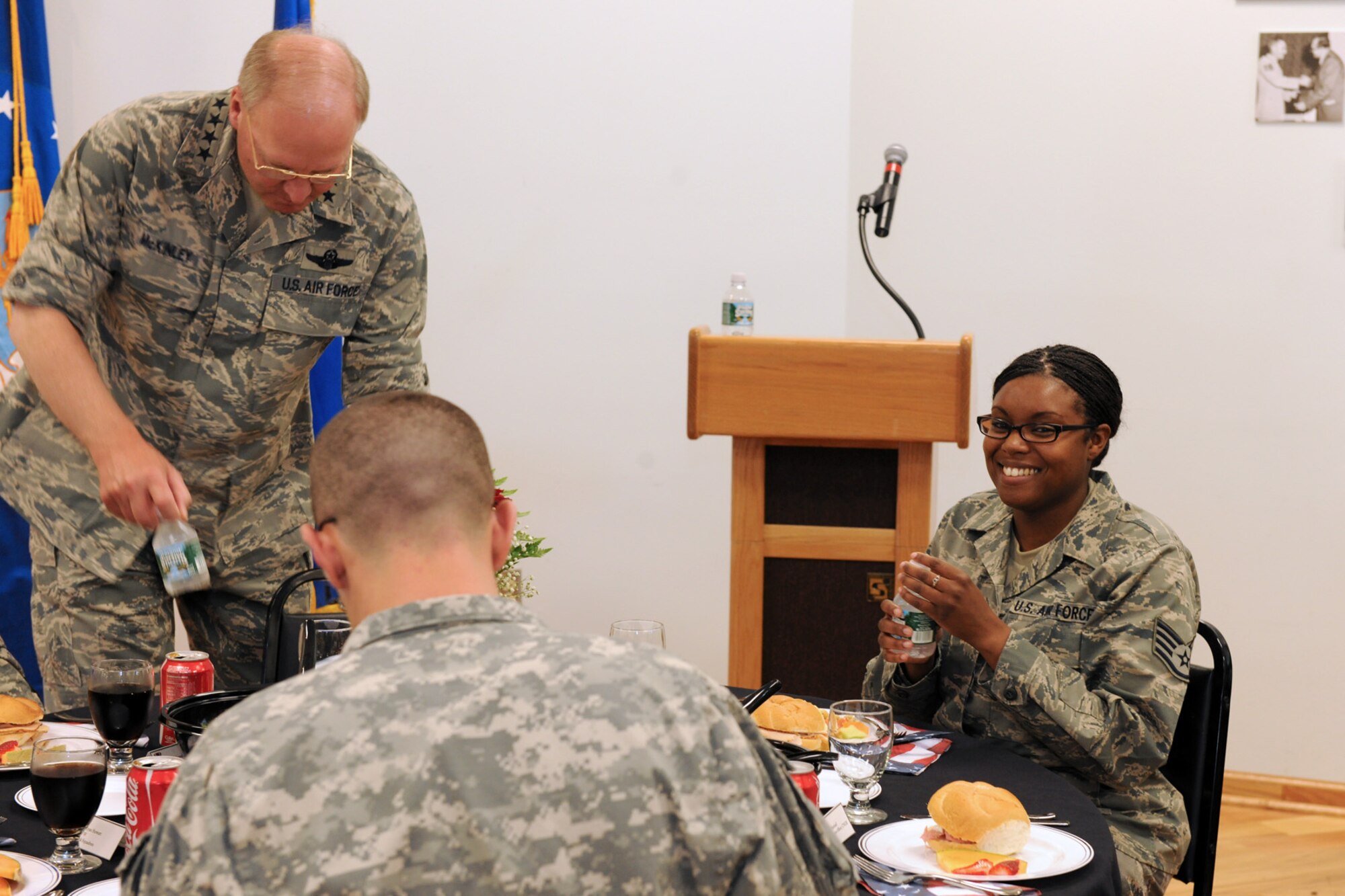 US Air Force Staff Sgt. Takeya A. Williams enjoys her lunch with the National Guard Bureau Chief, Gen. Craig R. McKinley along with members of the New York Air National Guard's 174th Fighter Wing and members of the New York Army National Guard's 27th Brigade at Hancock Field in Syracuse NY on 5 May 2010. McKinley was meeting with members of the New York Air and Army guard at a luncheon to recognize the efforts of the men and women of these organizations. (US Air Force photo by Tech. Sgt. Jeremy M. Call/Released)