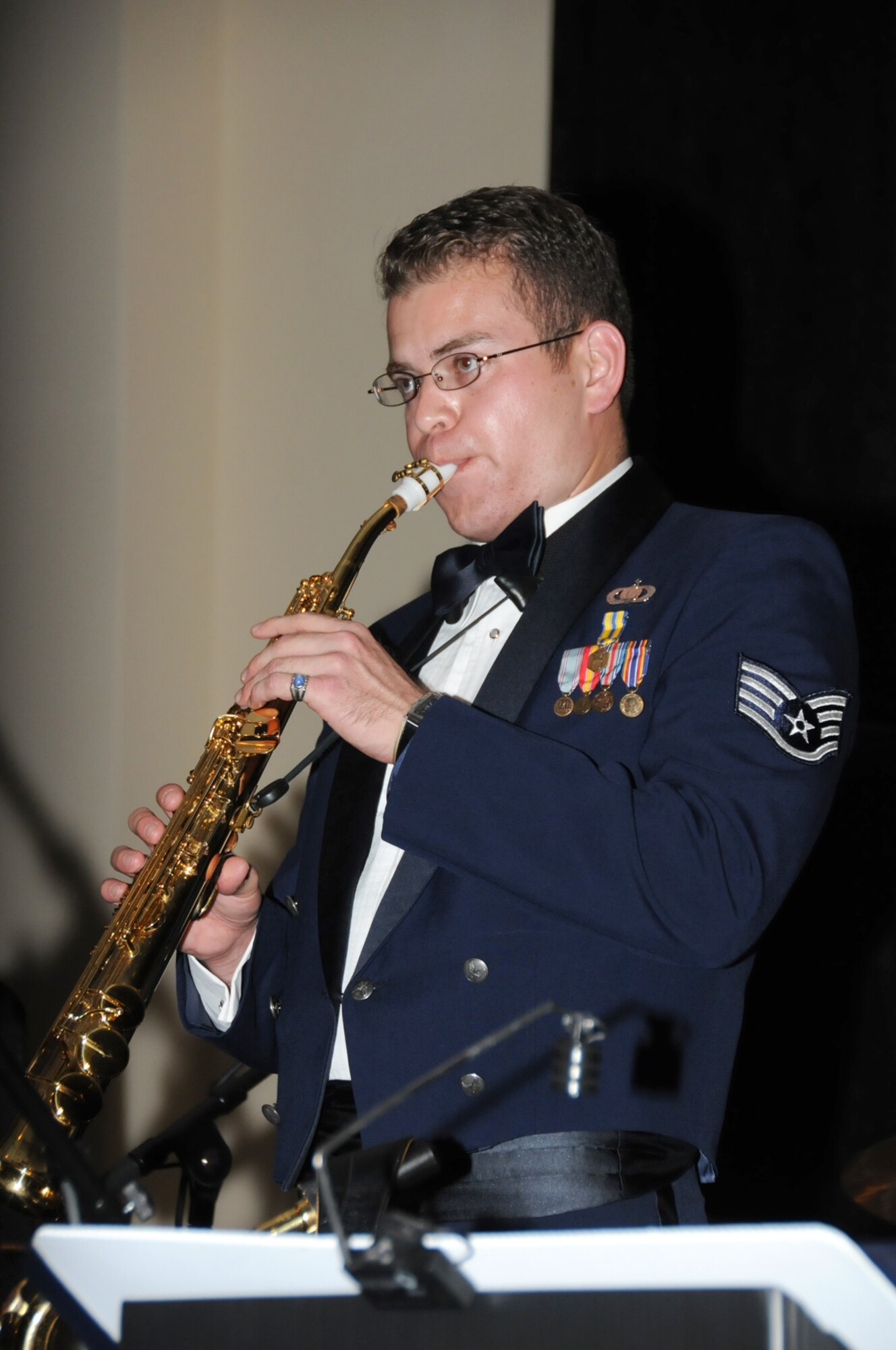 Staff Sgt. Miles Hudlow performs with the Air Force Reserve Jazz Ensemble Full Spectrum during the 81st Training Group's dining in, April 30 at the Mississippi Coast Coliseum and Convention Center in Biloxi.  (U.S. Air Force Photo by Kemberly Groue)