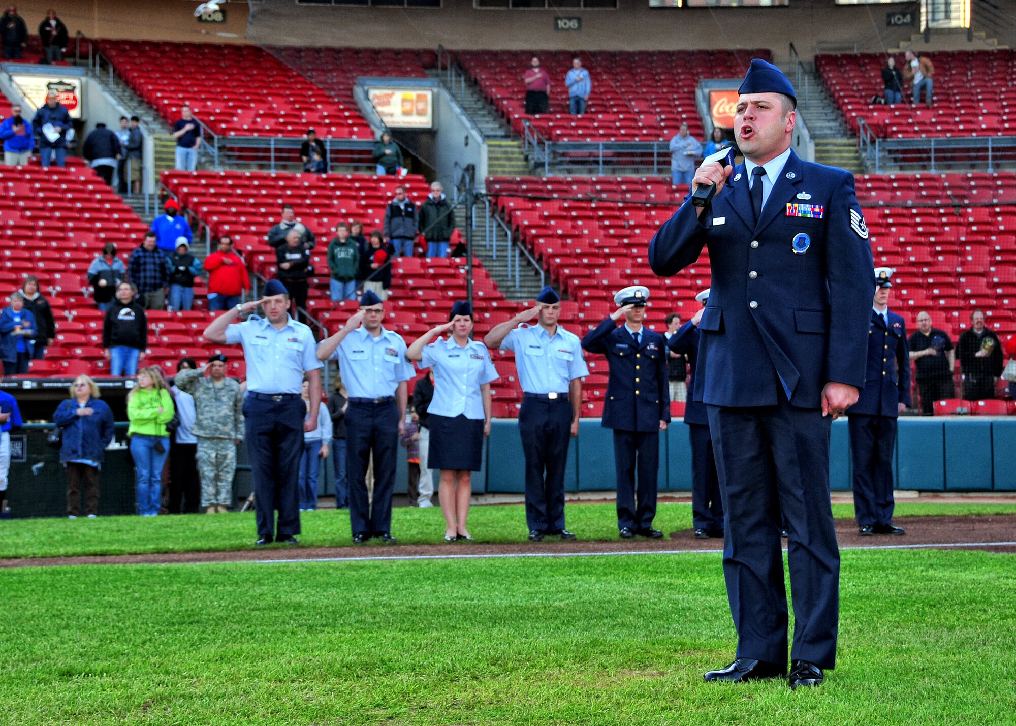 Technical Sgt. Joel Laureano of the 914th Airlift Wing Recruiting Office sings the National Anthem during the pregame events at Coca-Cola Stadium, May 4, 2010, Buffalo NY.  This was just one of many events held during Armed Forces Week. (U.S. Air Force photo by Staff Sgt. Joseph McKee)