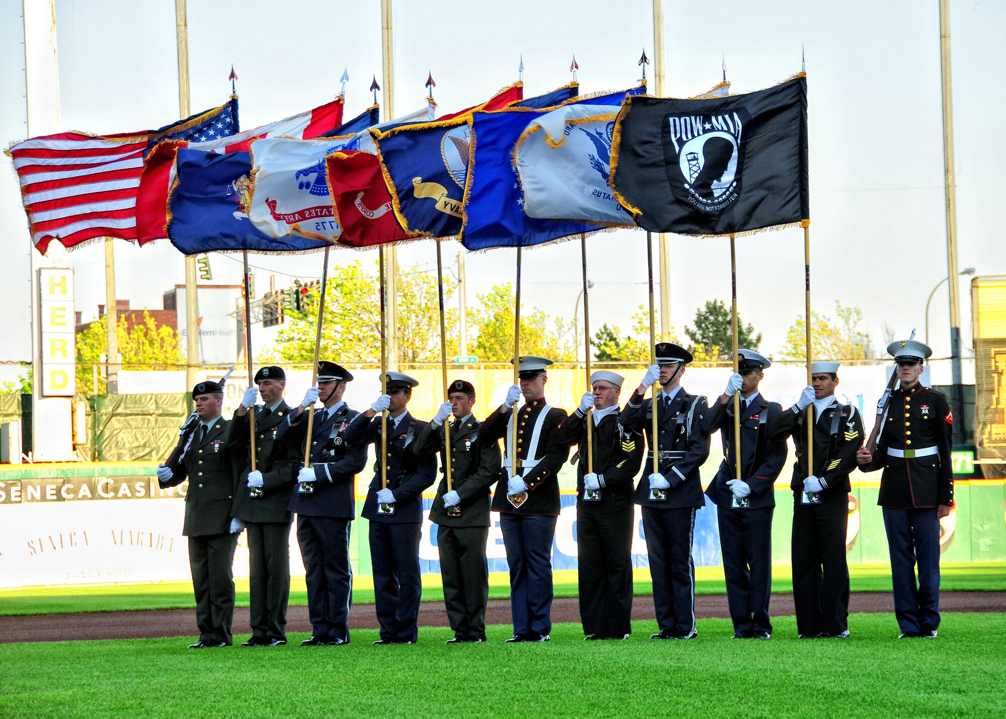 As part of Military appreciation night a multi-branch honor guard displays the colors on the field during the pregame events at Coca-Cola Stadium, May 4, 2010, Buffalo NY.  This was just one of many events during Armed Forces Week. (U.S. Air Force photo by Staff Sgt. Joseph McKee)