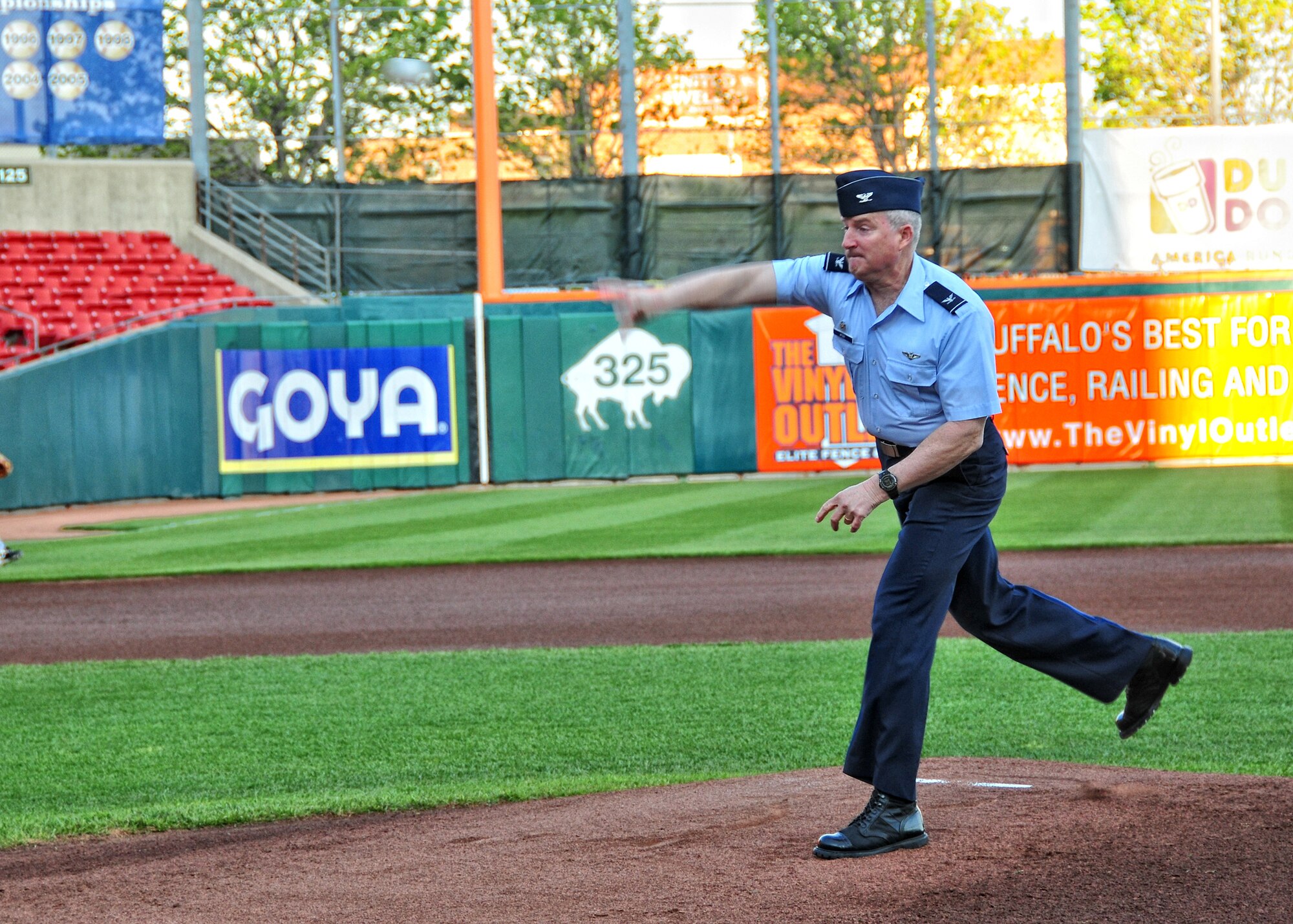 As part of Military appreciation night Col. Timothy J. McCoy of the 914th Airlift Wing throws out one of the first pitches during the pregame events at Coca-Cola Stadium, May 4, 2010, Buffalo NY.  This was just one of many events held during Armed Forces Week. (U.S. Air Force photo by Staff Sgt. Joseph McKee)