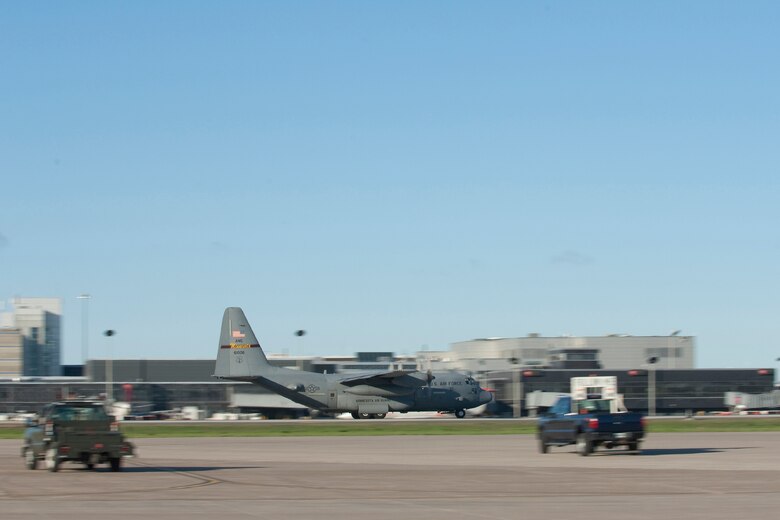 A Minnesota Air National Guard C-130 "Hercules" cargo aircraft races down the runway and takes off from the Minneapolis St. Paul International Airport on May 1, 2010.  Minnesota Airmen from the St. Paul Air National Guard base are deploying to Southwest Asia in support of Operation Enduring Freedom. USAF photo by Senior Master Sgt. Mark Moss (Released)