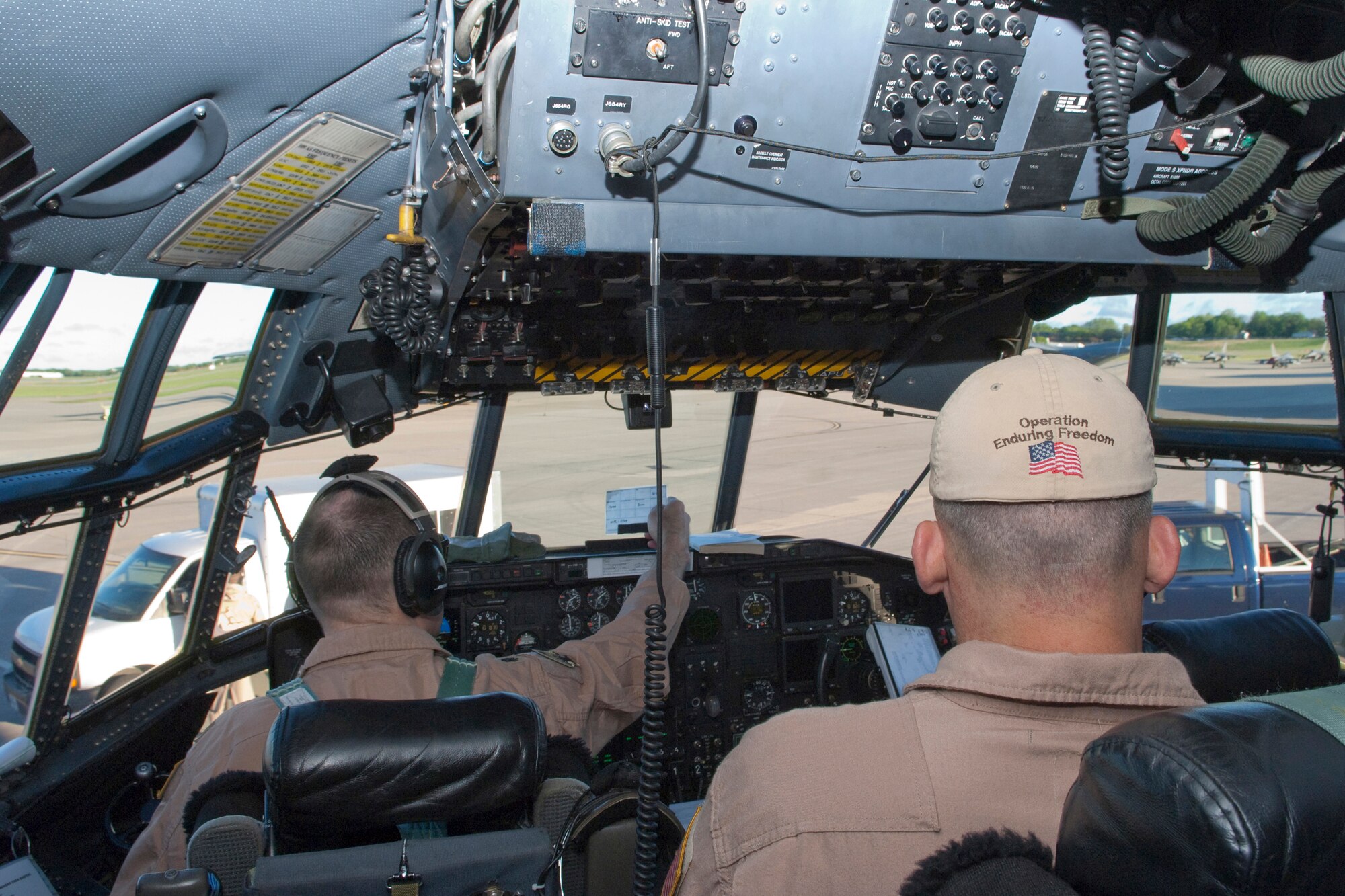The air crew of a C-130 "Hercules" cargo aircraft works through their checklist before launching on a trip to Southwest Asia on May 1, 2010. Deployers from the Minnesota Air National Guard C-130 unit at the St. Paul Air National Guard base will be transporting troops and supplies around the region. USAF photo by Senior Master Sgt. Mark Moss (Released)