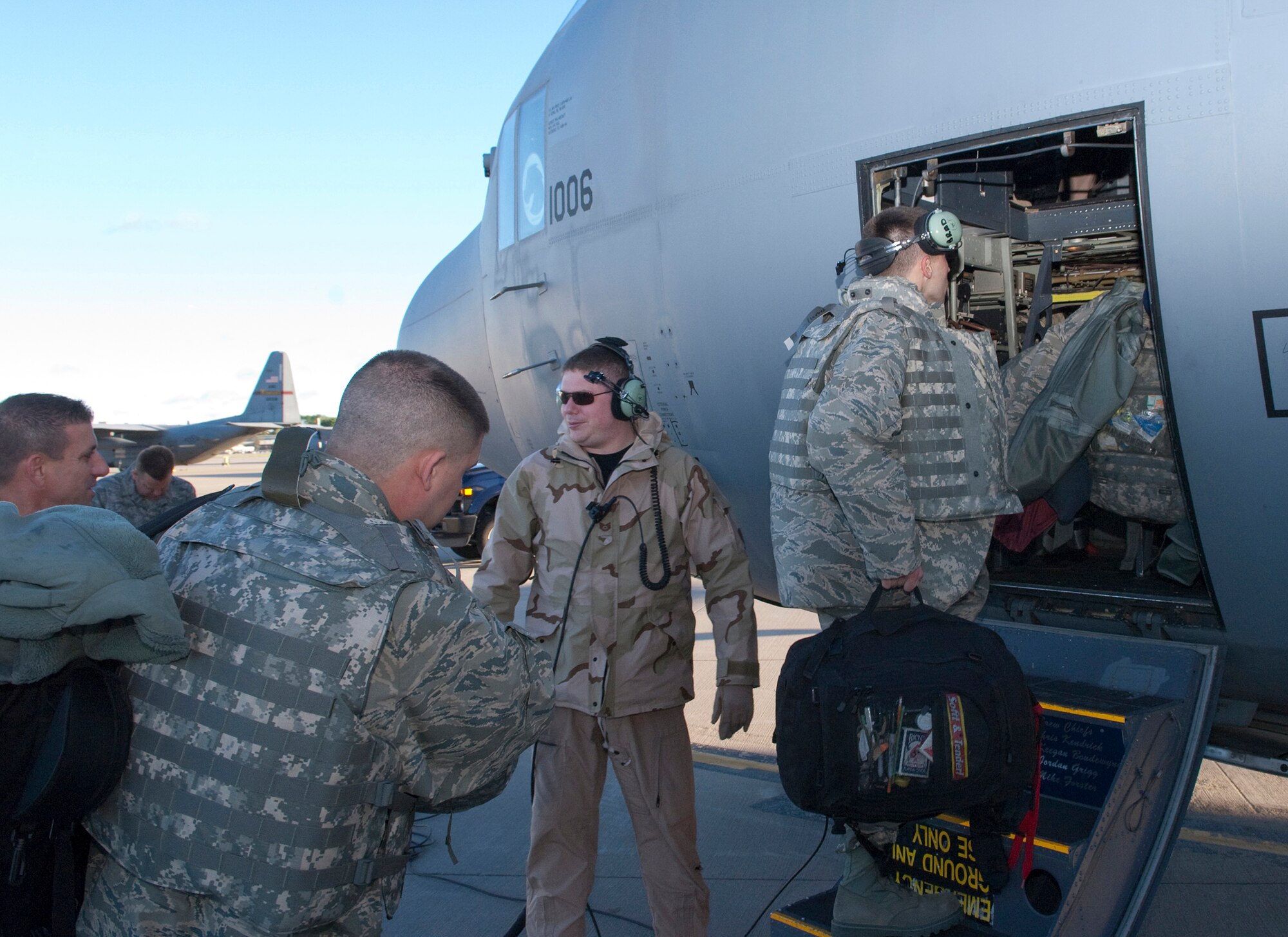 Deployers board a Minnesota Air National Guard C-130 at the St. Paul Air National Guard base on May 1, 2010, on their way to duty in Southwest Asia. The Minnesota Air National Guard unit flies the C-130 "Hercules" cargo aircraft,  transporting troops and supplies around the region. USAF photo by Senior Master Sgt. Mark Moss (Released)